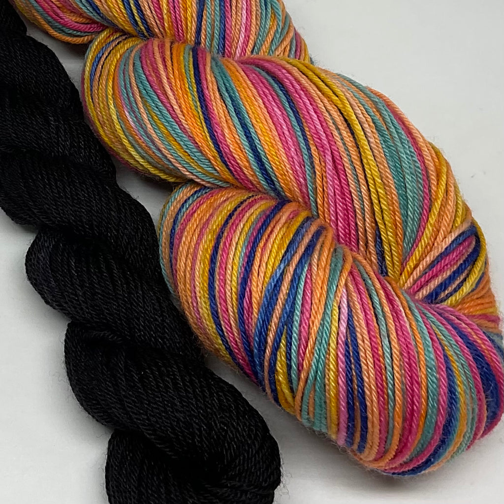 Treat People with Kindness Six Stripe Self Striping Sock Yarn with Coordinating Mini Skein
